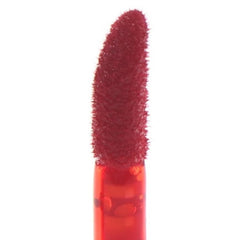 Close-up of Huitich lip stain applicator with rich red long lasting vegan lip color