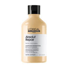 L'Oreal Absolut Repair shampoo bottle with black cap, beige label