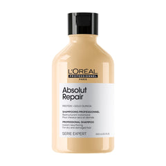 L'Oreal Absolut Repair Shampoo for dry damaged hair in a 300ml bottle designed for professional use