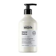 Sulfate-free shampoo bottle with black pump and white label