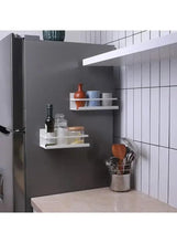 White metal magnetic wall rack set holding jars and bottles
