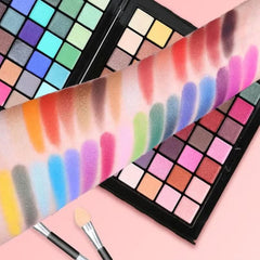 Huitich 177 color makeup palette set with diverse vibrant eyeshadow swatches on arm and makeup brushes