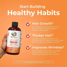 Liquid multivitamin bottle held in hand with Healthy Habits claims