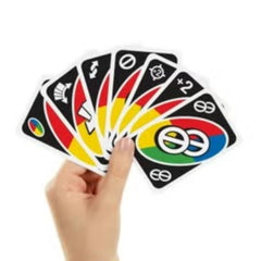 Hand holding UNO All Wild card game cards with colorful wild and action cards displayed