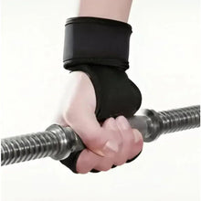 Black fitness gloves on hands holding a barbell bar