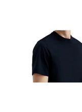 Navy blue crew-neck short-sleeve cotton T-shirt, chest close-up
