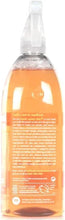 Method daily kitchen cleaner spray bottle close-up, orange with back label text