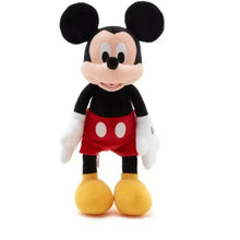 Inflatable Mickey Mouse character with black ears, red shorts, yellow shoes, standing