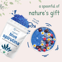 Micro Ingredients bag spilling organic blue spirulina powder next to blue smoothie bowl with berries and flowers