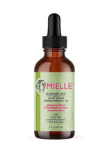 Scalp and hair strengthening oil bottle with black dropper and green front label