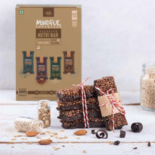 Assorted nutribar box with tied stacks of dark bars and scattered pieces