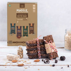 Mindful Nutri Bar box and stacked chocolate crisp energy bars tied with twine with oats and almonds gluten free energy bars UAE
