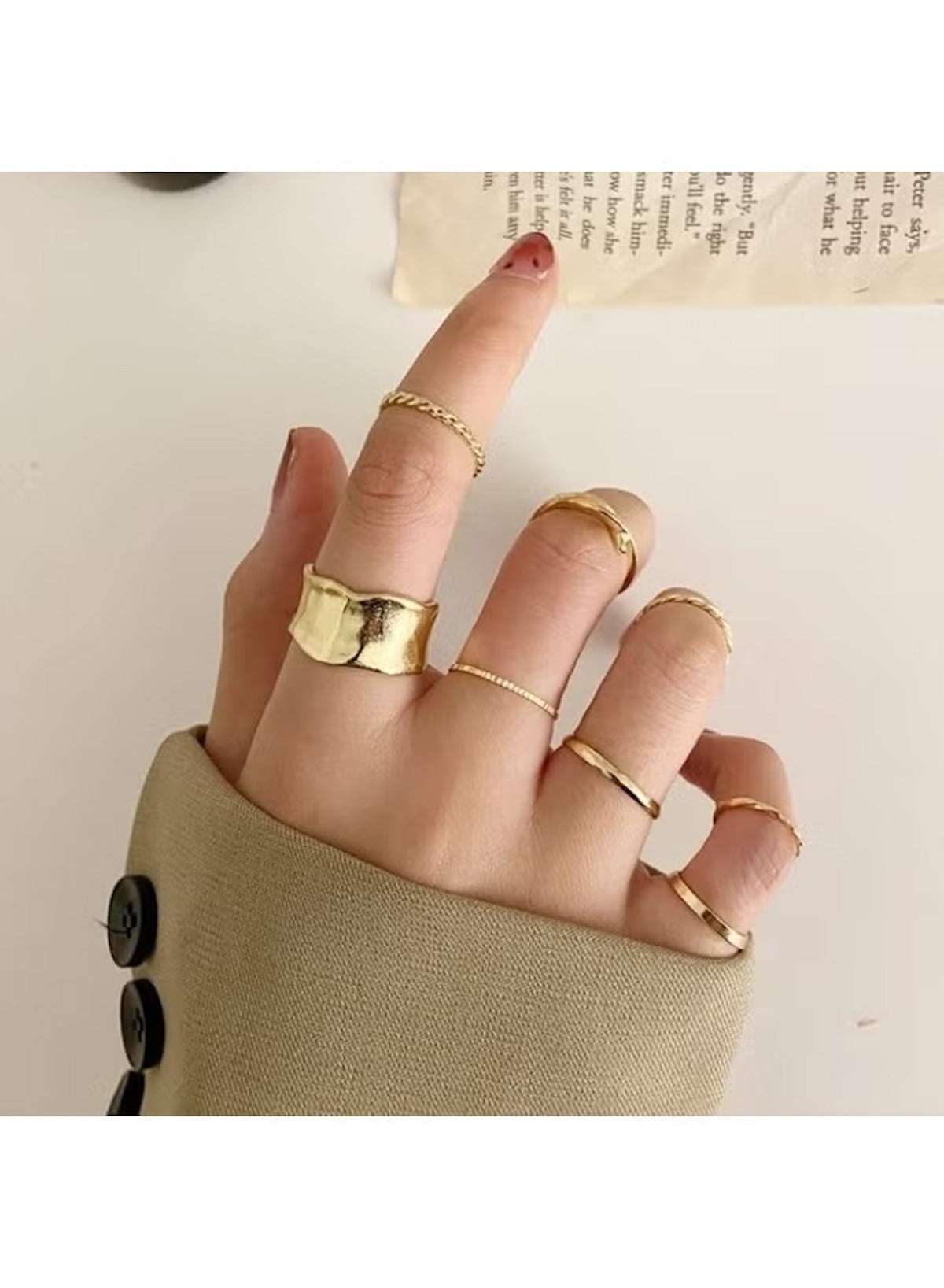 Huitich minimalist gold ring set for women displayed on a hand with multiple stylish rings