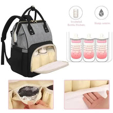 Grey and black baby travel bag with insulated bottle pockets and open storage