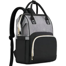 Grey and black baby travel bag with front zip pocket and top handles