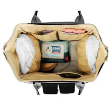Open grey and black baby travel bag with padded side compartments and inner organizer