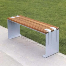 Outdoor bench with long wood top and white rectangular base, side view