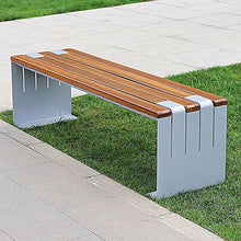 Outdoor bench with wood slat tabletop on white bases, angled view