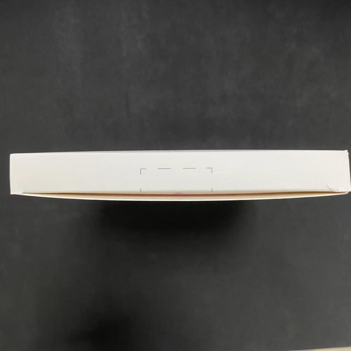 Sealed white product box on black background for MOMMED HCG midstream pregnancy test packaging