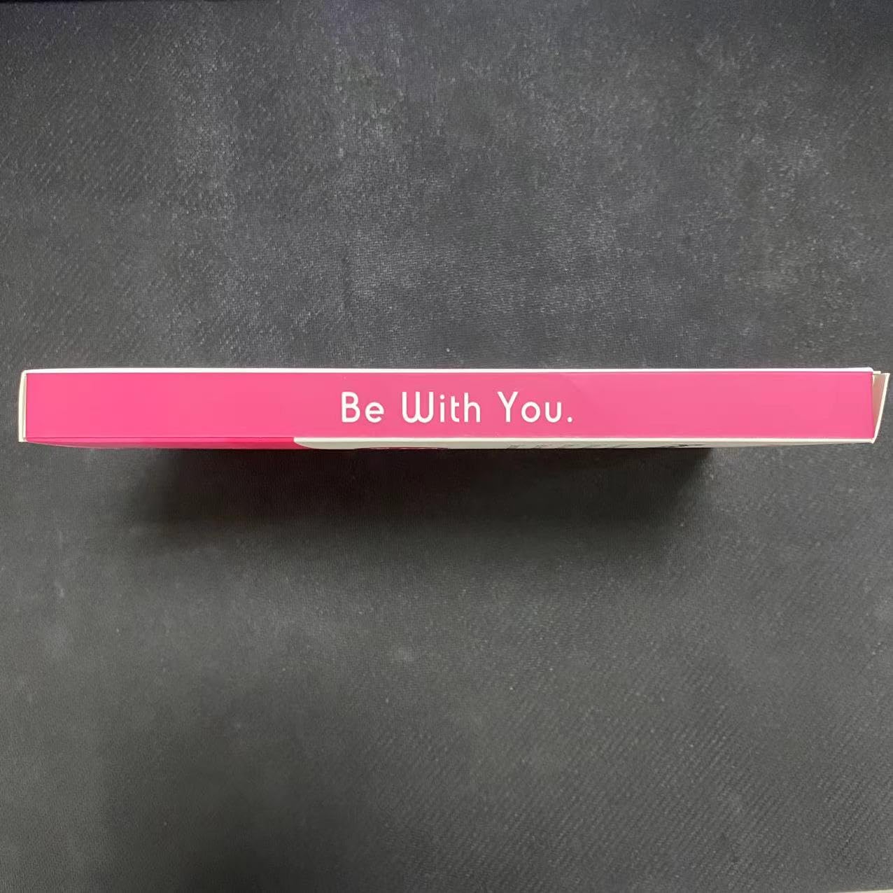 MOMMED HCG midstream pregnancy test pink box side with Be With You text on dark textured background packaging