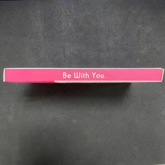 MOMMED HCG midstream pregnancy test pink box side with Be With You slogan on black background