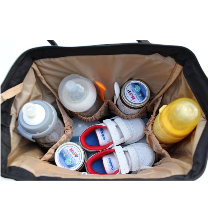 Huitich black and red baby travel bag with baby bottles, shoes, and accessories organized inside