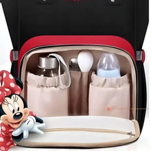 Zippered insulated baby backpack compartment with bottles and utensil accessories inside
