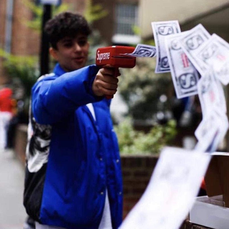 Money gun red can be sprayed 50 100 money Works on a 9 volt battery which is included manufacturer - Mumzar.com