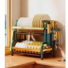 2-tier countertop dish rack with white plate rails, gold supports, utensil holder