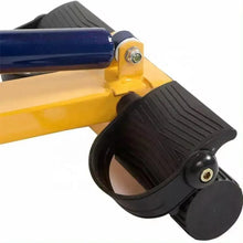 Rowing foot pedal with black grip and footplate attached to yellow frame arm