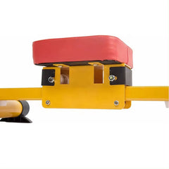 Close-up of red padded seat on yellow multi gym rower for children by Huitich