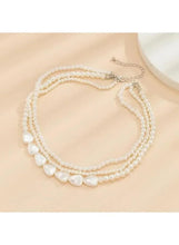 Multi-layer pearl choker necklace with round pearl drops and silver-tone clasp