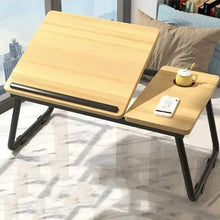 Adjustable reading tray table with light wood angled surface and side accessory tray
