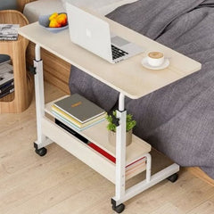 Huitich multi-tier study table with wheels in white holding a laptop, books, and a cup of coffee