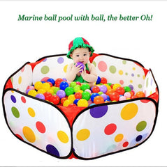 Baby playing in a playpen filled with 50-piece multicolored play balls for toddlers by Huitich