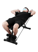 Adjustable incline bench with black padded cushions and red frame, lying position