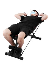 Man exercising on Huitich multifunctional dumbbell workout bench with resistance bands and adjustable backrest