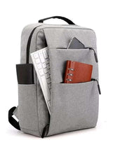 Light grey travel backpack with front pocket, side zipper tabs, and protective sleeve
