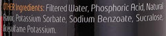 Muscle Core Nutrition L-Carnitine 89ml. Close up of supplement bottle ingredients list showing filtered water and sweeteners