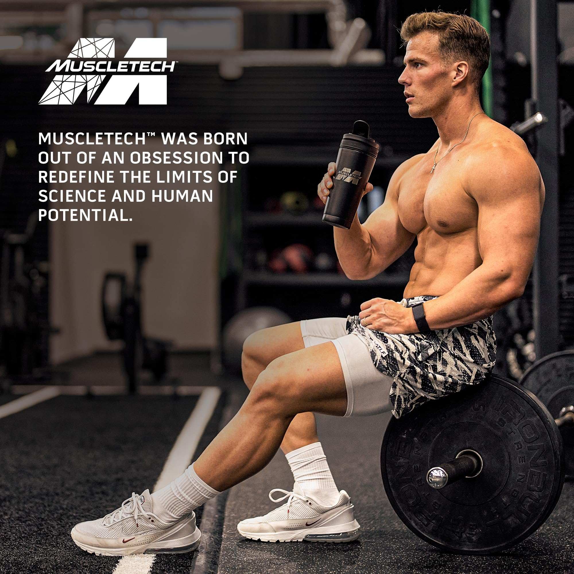 Muscletech creatine muscle builder powder image of muscular man sitting on loaded barbell holding shaker in gym