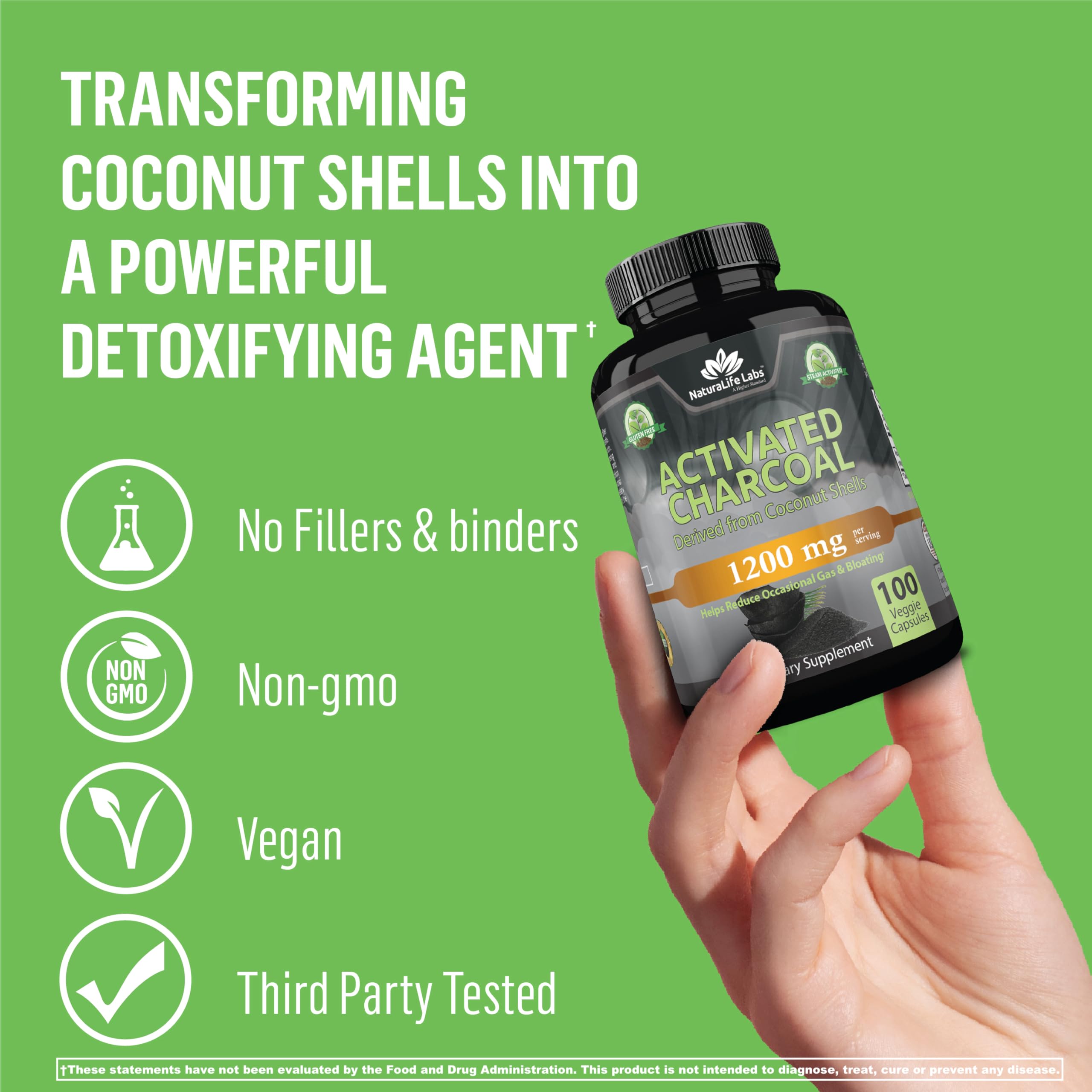 NaturaLife Labs handheld bottle of organic activated charcoal capsules on green background with vegan non GMO third party tested