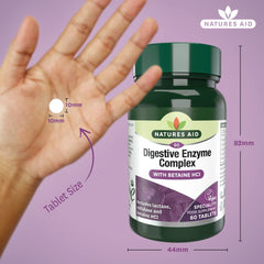 Natures Aid bottle of digestive enzyme complex tablets 60 count with hand showing 10mm tablet size and bottle measurements