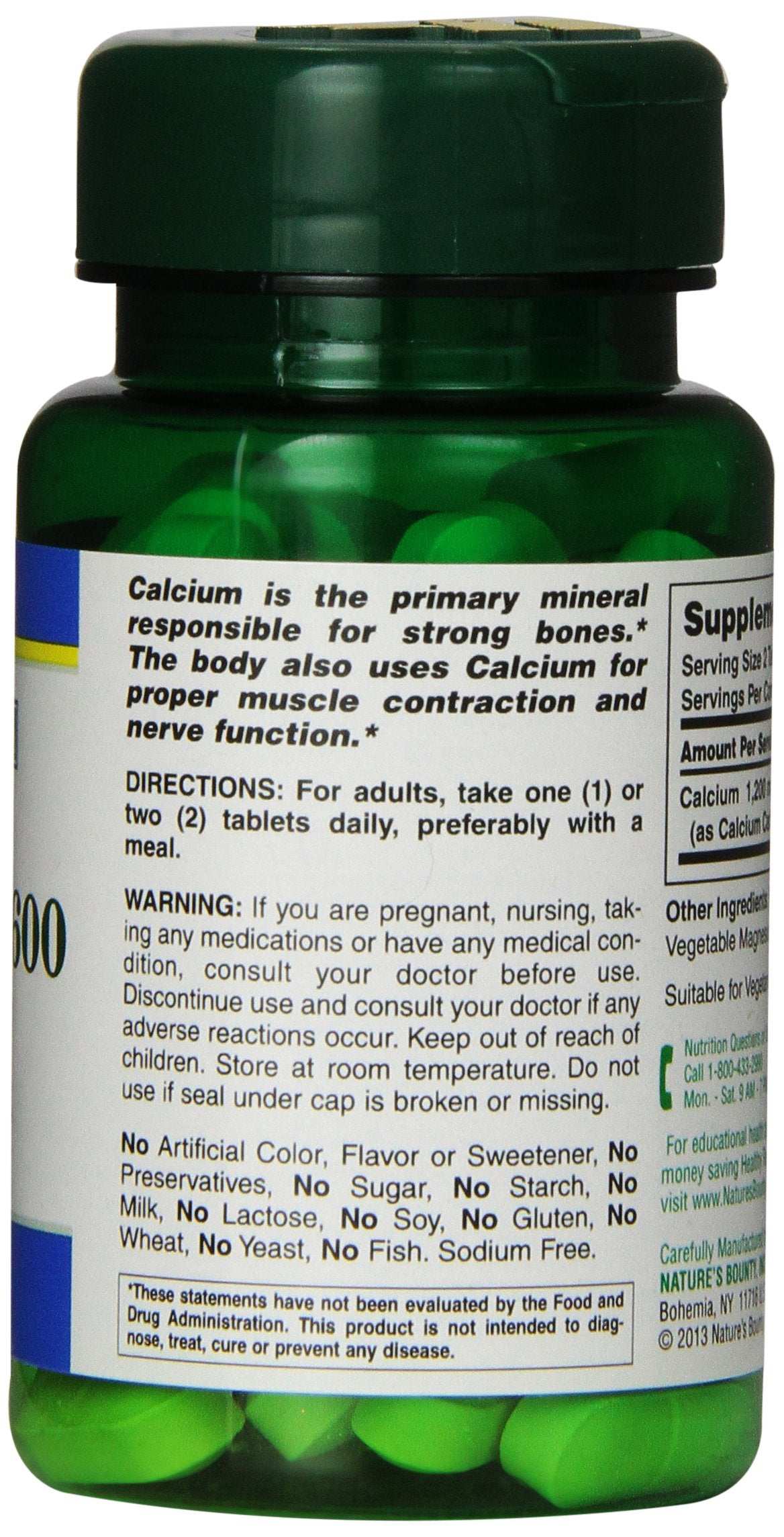 Natures Bounty green pill bottle of high potency calcium supplement UAE with nutrition label visible