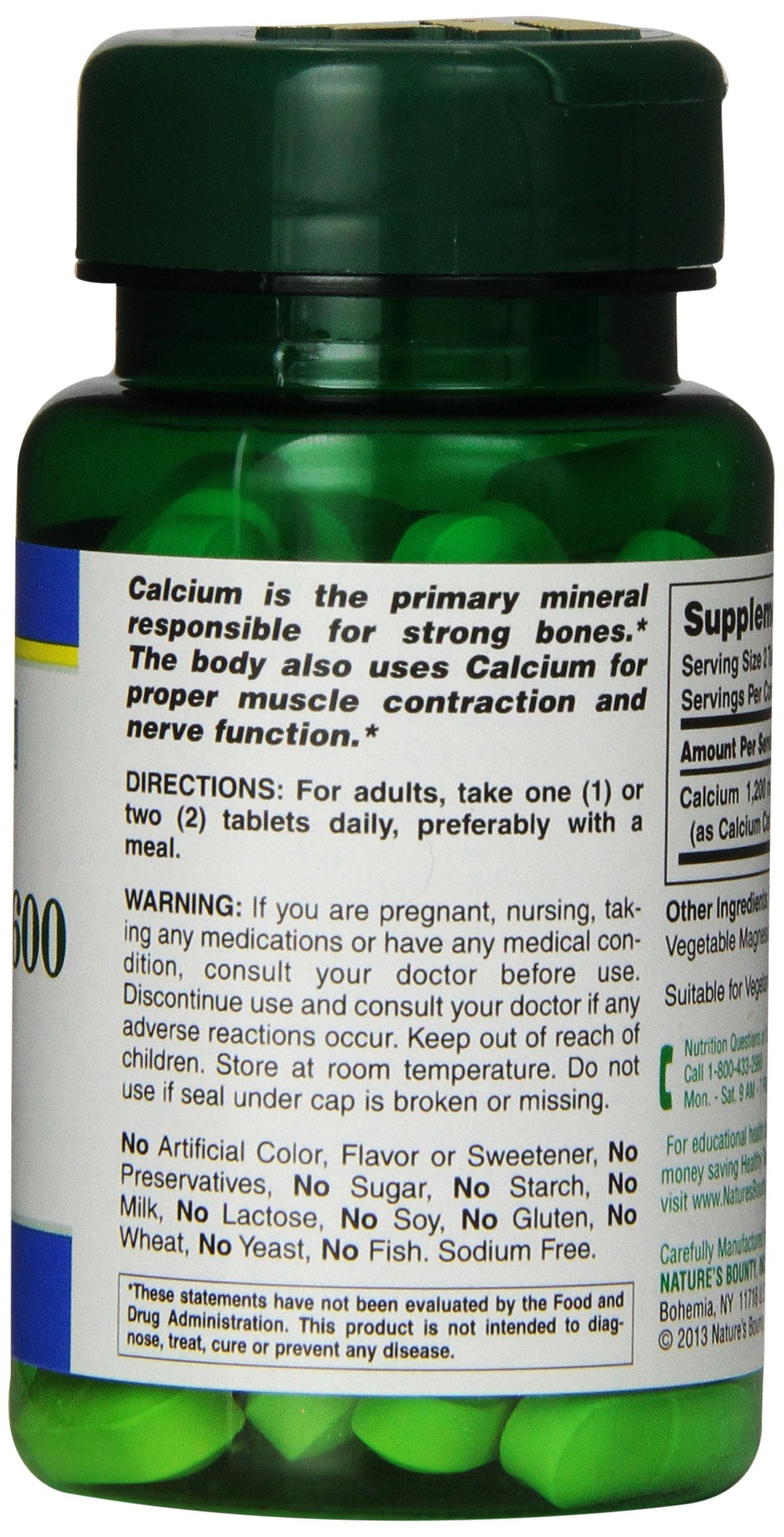 Natures Bounty green pill bottle of high potency calcium supplement UAE with nutrition label visible