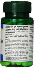 Natures Bounty green pill bottle of high potency calcium supplement UAE with nutrition label visible