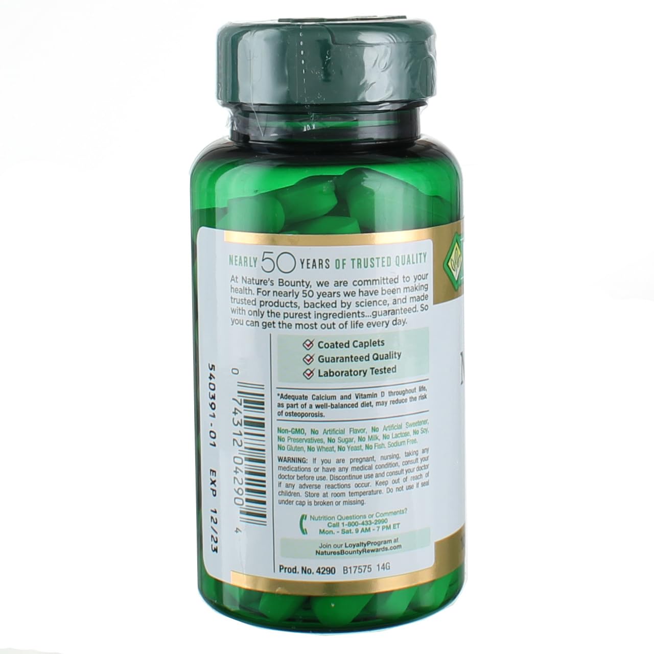 Back view of Nature's Bounty calcium magnesium zinc green supplement bottle showing label and coated cap with tablets inside