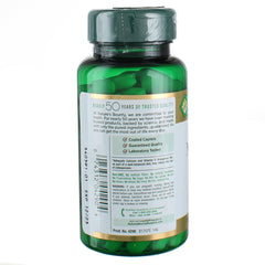 Back view of Nature's Bounty calcium magnesium zinc green supplement bottle showing label and coated cap with tablets inside