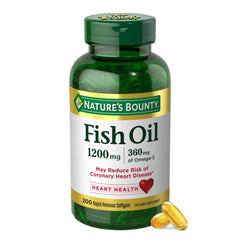 Bottle of Nature's Bounty fish oil 1200mg softgels green bottle label and two yellow capsules