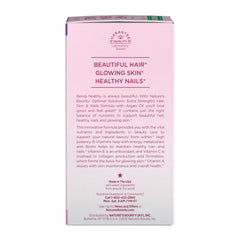 Back of pink Nature's Bounty hair supplements box showing Beautiful Hair Glowing Skin Healthy Nails claims and product description