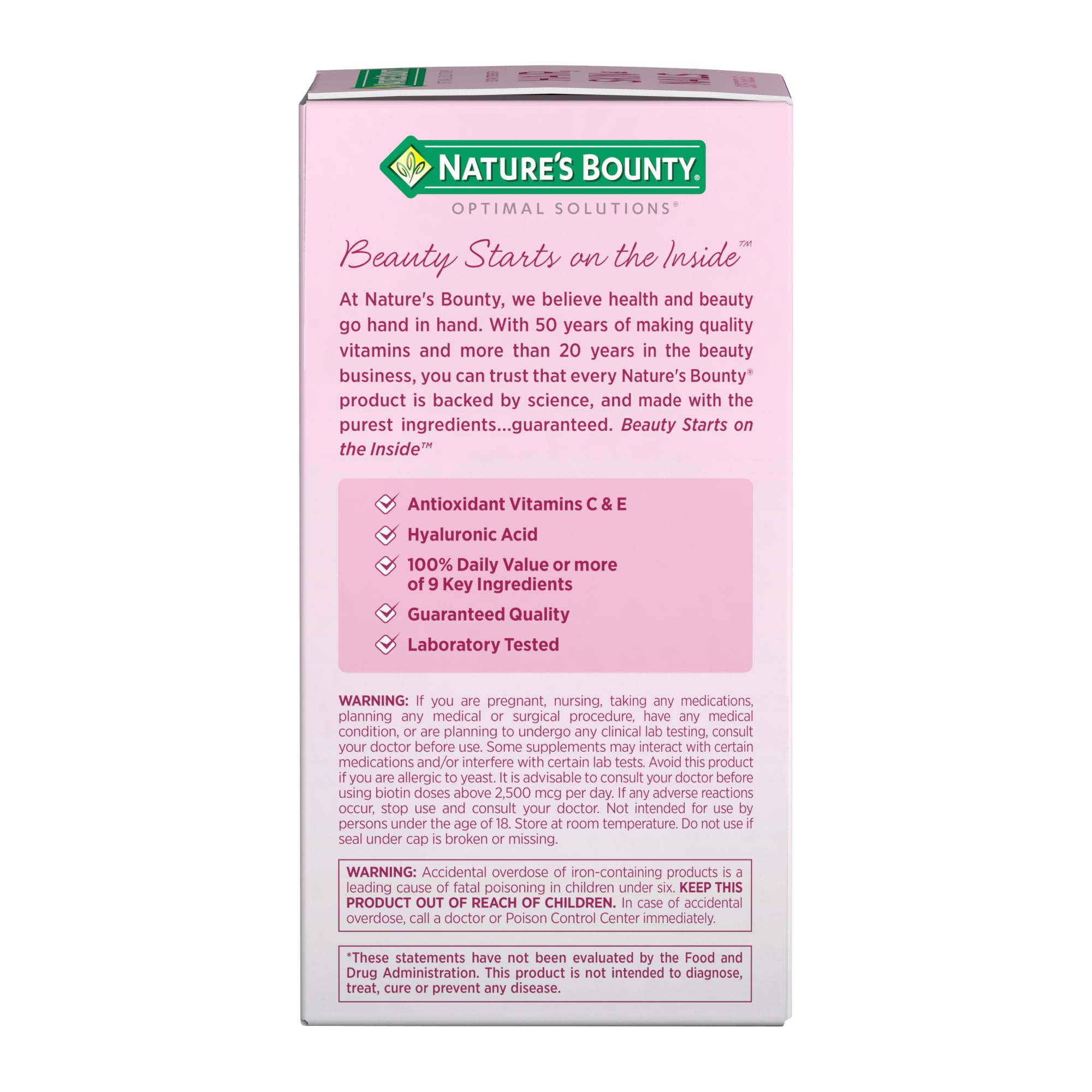Pink Nature's Bounty hair supplements box back panel showing product benefits ingredients warnings